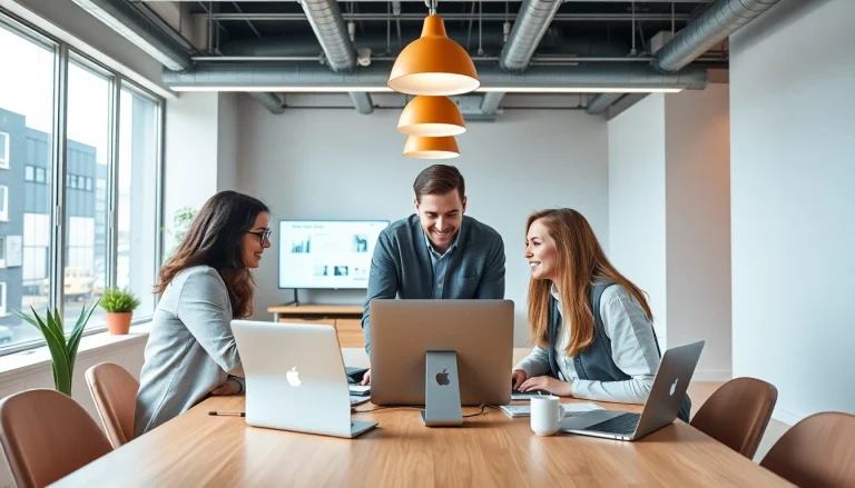 A talented team creating exceptional Auckland web design solutions in a collaborative workspace.